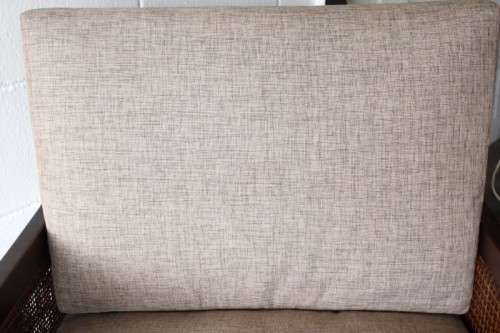 **RS17** A stylish solid mahogany & rattan armchair w/ matching ottoman with removable cushions