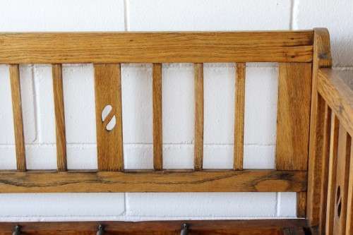 A very charming and sturdy 3-seater solid Oak daybed with carvings - perfect for sun room!