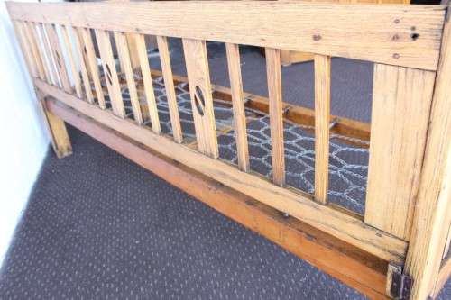 A very charming and sturdy 3-seater solid Oak daybed with carvings - perfect for sun room!