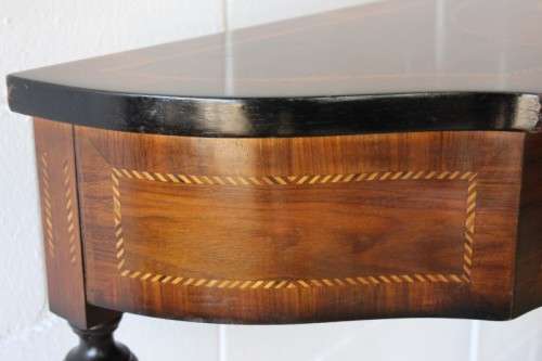 A stunning Italian "half-moon" console table with incredible marquetry and rail inlay detailing