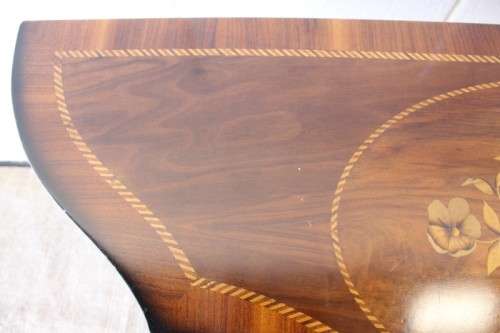 A stunning Italian "half-moon" console table with incredible marquetry and rail inlay detailing