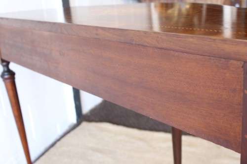 A stunning Italian "half-moon" console table with incredible marquetry and rail inlay detailing