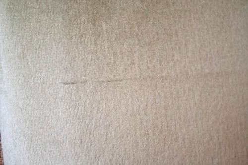 **RS17**  A hand-carved antique Victorian slipper/ nursing chair upholstered in a soft green fabric