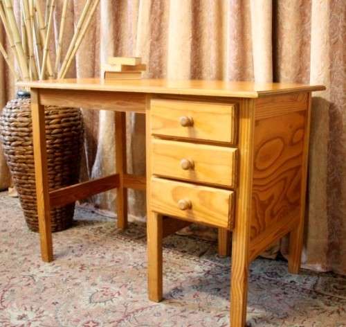 **RS17** A lovely wooden writing/work desk with three spacious drawers in great condition.