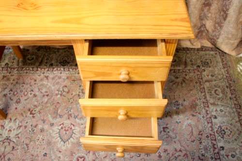 **RS17** A lovely wooden writing/work desk with three spacious drawers in great condition.