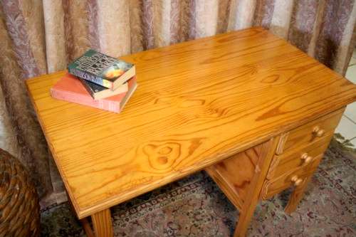 **RS17** A lovely wooden writing/work desk with three spacious drawers in great condition.