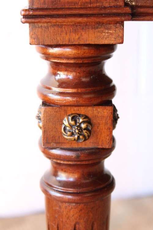 A beautifully detailed vintage Mahogany Regency leather-top library desk with drawers & fluted legs