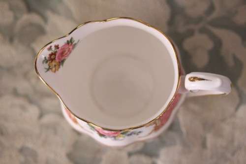A gorgeous Royal Albert fine bone china milk jug/ creamer in the very pretty "Lady Carlyle"  pattern