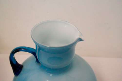 A superb vintage Retro Kanawha glass blue with white interior "pitcher" vase.
