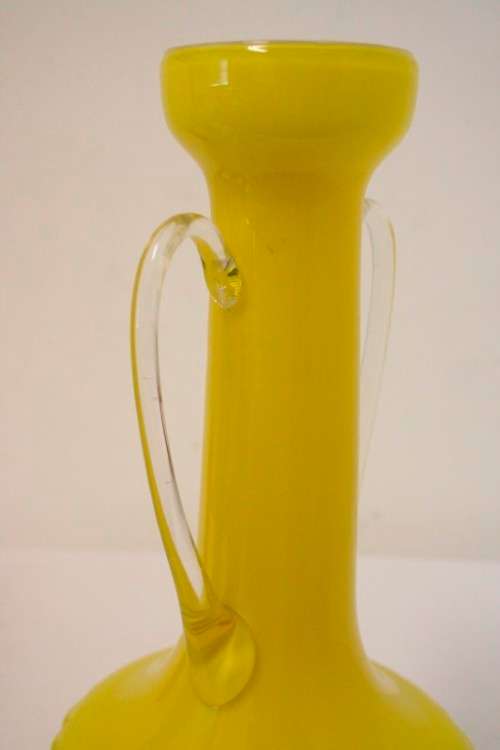 A superb vintage Retro Kanawha glass yellow with white interior handled vase.