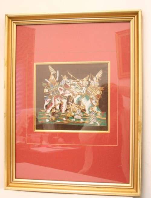 **RS17** A framed Oriental warrior scene painting on silk like material w awesome rich colours.