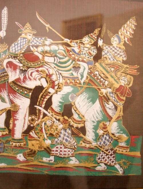 **RS17** A framed Oriental warrior scene painting on silk like material w awesome rich colours.