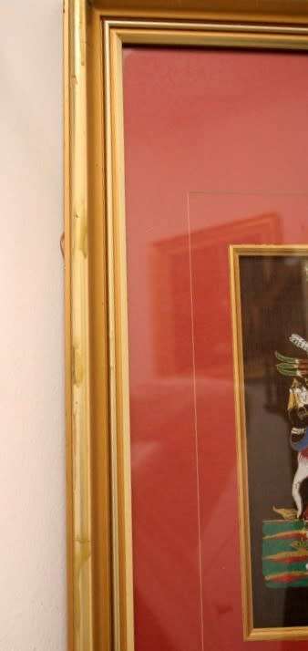 **RS17** A framed Oriental warrior scene painting on silk like material w awesome rich colours.