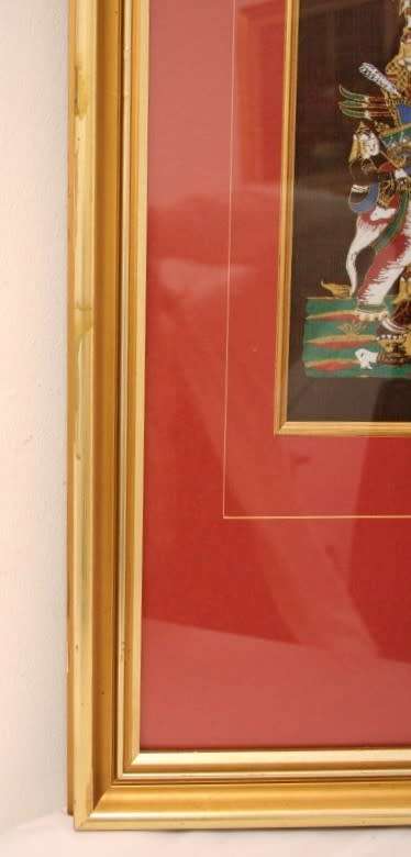 **RS17** A framed Oriental warrior scene painting on silk like material w awesome rich colours.