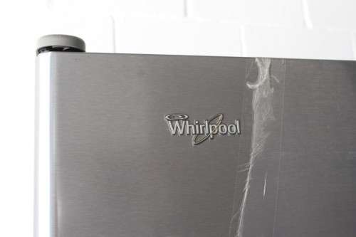 A quality Whirlpool stainless steel bottom freezer 620 litre fridge-freezer combo; never used