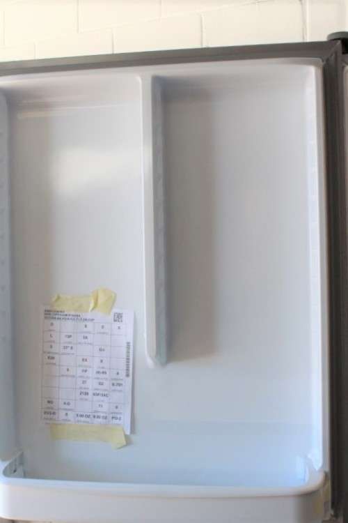 A quality Whirlpool stainless steel bottom freezer 620 litre fridge-freezer combo; never used