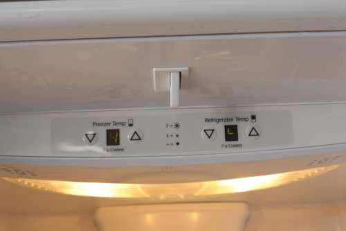 A quality Whirlpool stainless steel bottom freezer 620 litre fridge-freezer combo; never used