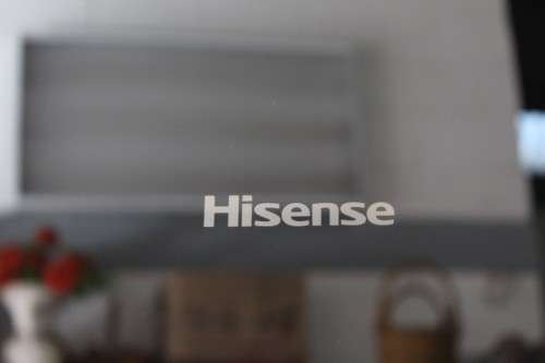 A style Hisense 323 litre mirror-front upright fridge-freezer combo with water dispenser