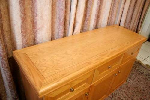 **RS17** A modern Oak side server cabinet with three large drawers and loads of cupboard space.