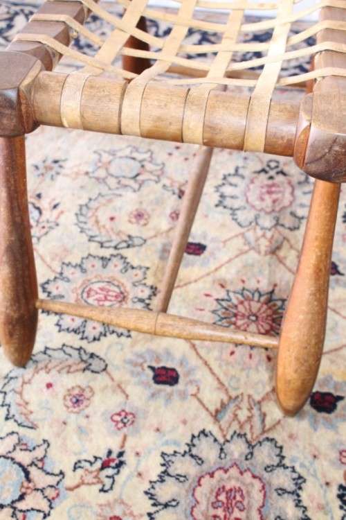 **RS17** An amazing, sturdy vintage/ antique? Brazilian broad leather-strap stool/ footstool