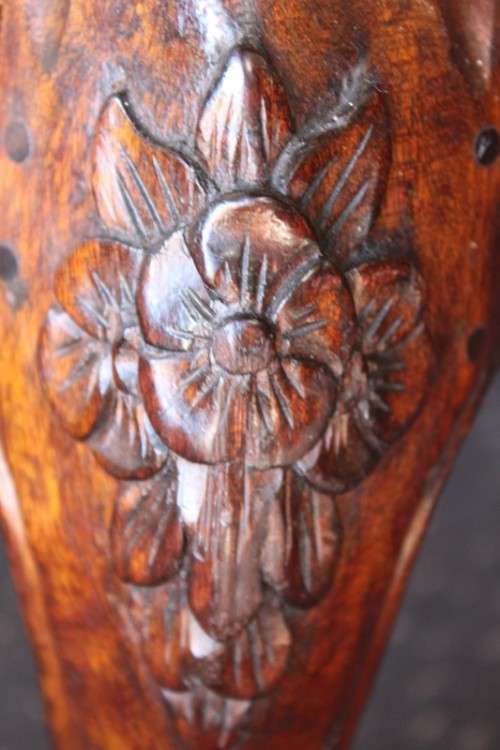 A beautiful antique Victorian Walnut deep-button camel-back sofa with stunning hand-carved detailing