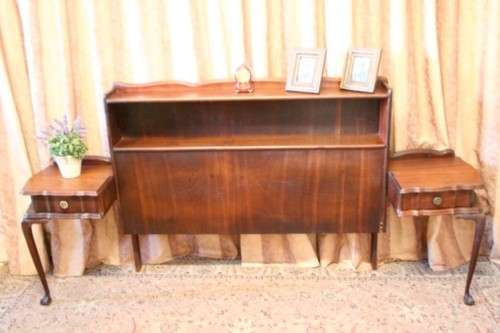 A fantastic vintage solid Imbuia ball and claw headboard with drawer pedestals.