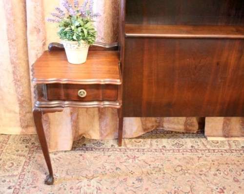 A fantastic vintage solid Imbuia ball and claw headboard with drawer pedestals.