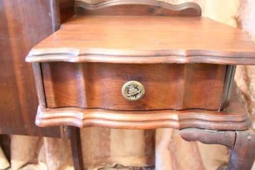 A fantastic vintage solid Imbuia ball and claw headboard with drawer pedestals.