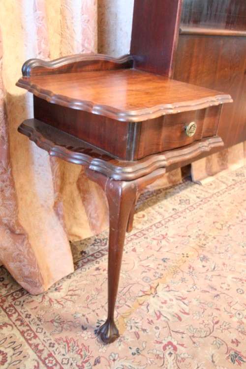 A fantastic vintage solid Imbuia ball and claw headboard with drawer pedestals.