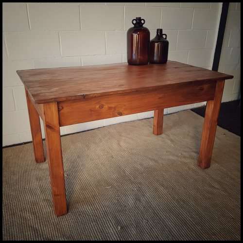 A lovely wooden dining/ work table with a simple design - perfect to re-paint or shabby chic