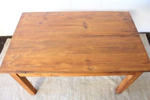 A lovely wooden dining/ work table with a simple design - perfect to re-paint or shabby chic