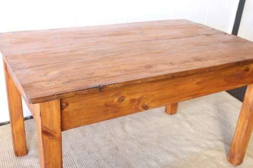 A lovely wooden dining/ work table with a simple design - perfect to re-paint or shabby chic
