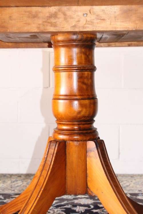 **RS17** A well made round glass-top hall/ foyer table w/ solid turned pedestal leg & broad fascia