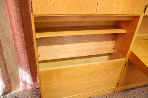 **RS17** A beautifully made wall unit/ cabinet with loads of cupboards and a lift top writing desk.