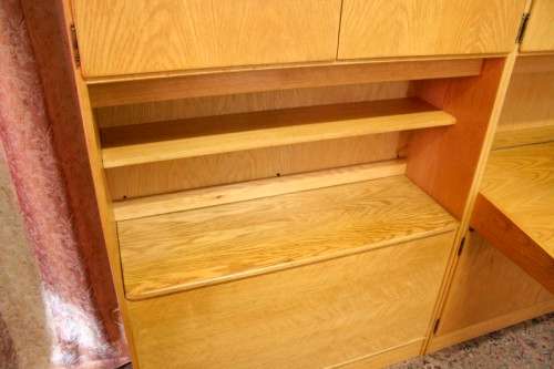 **RS17** A beautifully made wall unit/ cabinet with loads of cupboards and a lift top writing desk.
