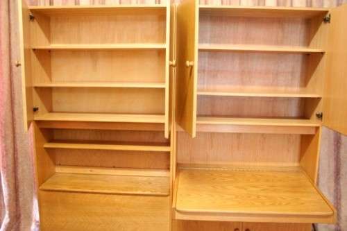 **RS17** A beautifully made wall unit/ cabinet with loads of cupboards and a lift top writing desk.