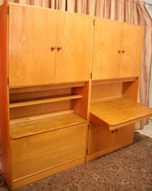 **RS17** A beautifully made wall unit/ cabinet with loads of cupboards and a lift top writing desk.