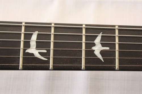 A superb "PRS" SE Orianthi signature "red sparkle" electric guitar in good condition w/ carry bag!