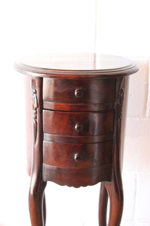 **RS17** A carved solid Balinese Teak 3-drawer pedestal table/ lamp table in beautiful condition