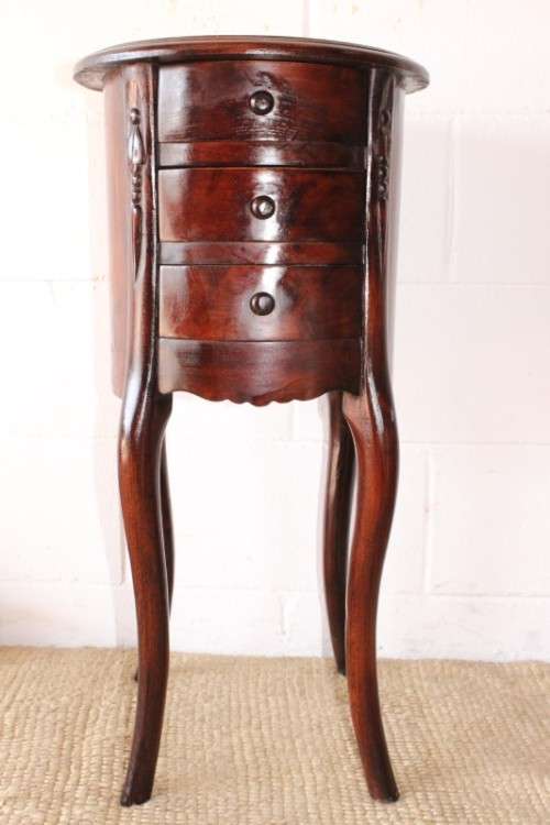 **RS17** A carved solid Balinese Teak 3-drawer pedestal table/ lamp table in beautiful condition
