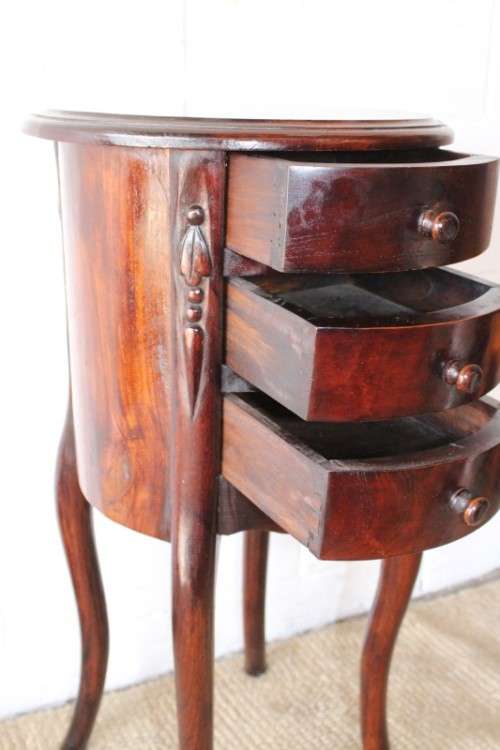 **RS17** A carved solid Balinese Teak 3-drawer pedestal table/ lamp table in beautiful condition
