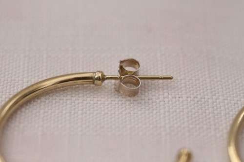 A beautiful and substantial pair of 9ct yellow gold ladies 2mm wide hoop earrings