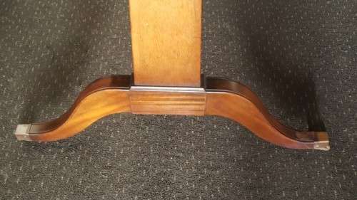 A beautiful vintage Regency styled ladies embossed leather-top 3-drawer writing desk on castors