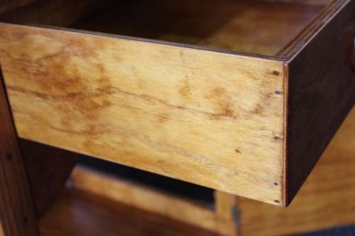 A stunning & unusual vintage oak drop-leaf dining table with a cupboard and three storage drawers