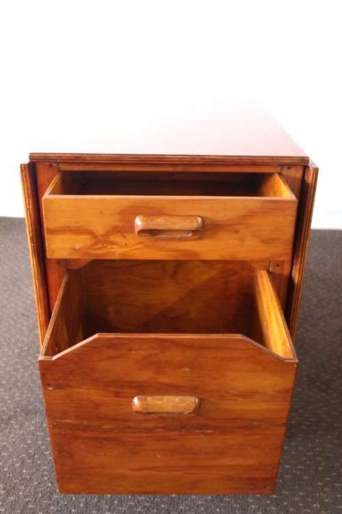 A stunning & unusual vintage oak drop-leaf dining table with a cupboard and three storage drawers