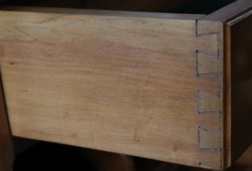 An incredible and beautifully made solid oregon wood 30-bottle wine rack with a smalls drawer