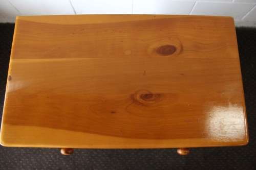 An incredible and beautifully made solid oregon wood 30-bottle wine rack with a smalls drawer