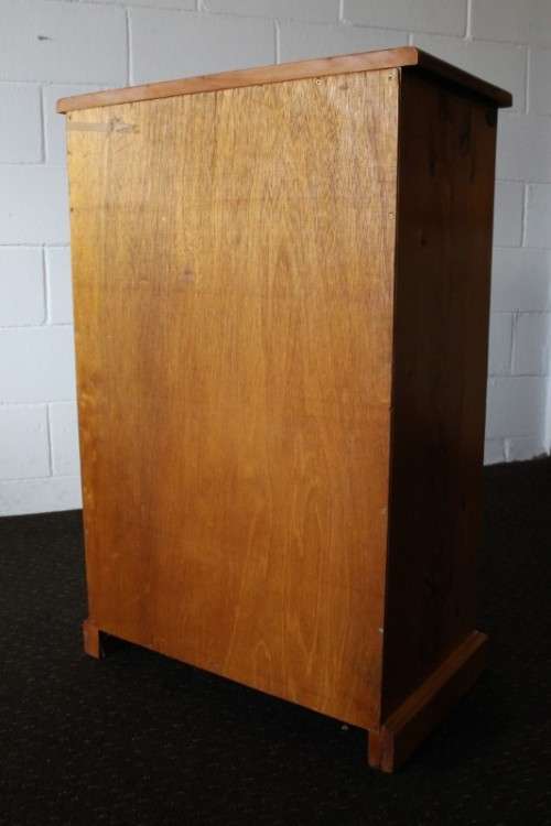 An incredible and beautifully made solid oregon wood 30-bottle wine rack with a smalls drawer