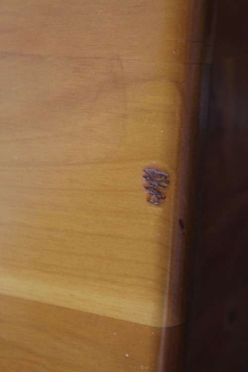 An incredible and beautifully made solid oregon wood 30-bottle wine rack with a smalls drawer