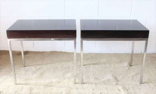 A fabulous pair of modern styled chromed-framed coffee tables with a broad wood profiles